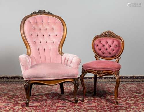 A Victorian mahogany framed parlour chair with button tufted...