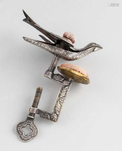 A 19th century sewing clamp in the form of a bird. 4 3/4 in....