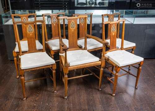 A set of seven Swedish Art Nouveau dining chairs