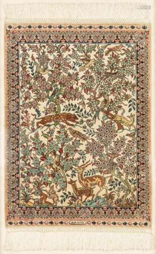 A signed Isphahan silk mat, 17 x 12 in. (43.2 x 30.5 cm.)