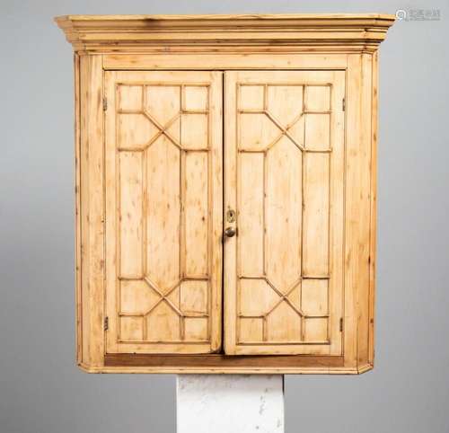 An 18th century pine corner cabinet, 45 1/2 x 43 1/2 x 25 in...