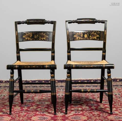 A pair of American Hitchcock stenciled and ebonized chairs