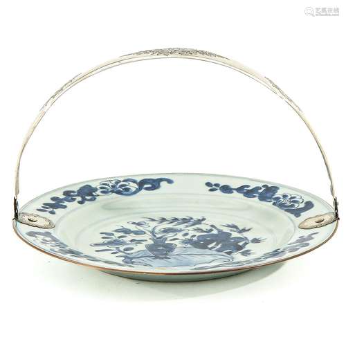 A Blue and White Plate with Silver Handle