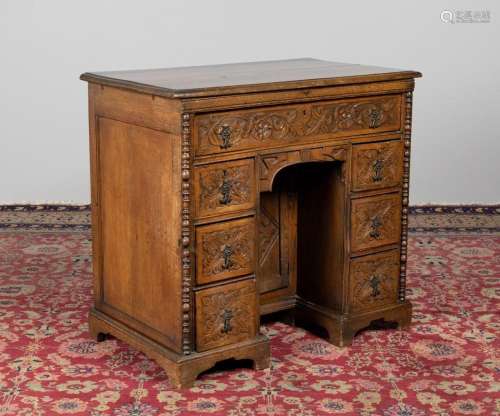 An oak kneehole desk, 31 x 34 x 20 in. (78.74 x 86.36 x 50.8...