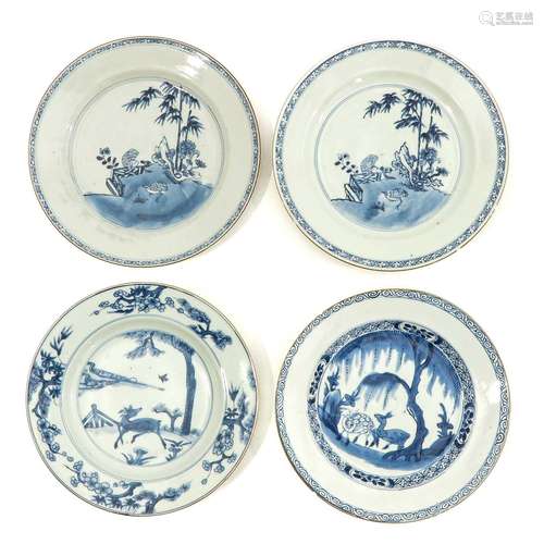 A Collection of 4 Blue and White Plates