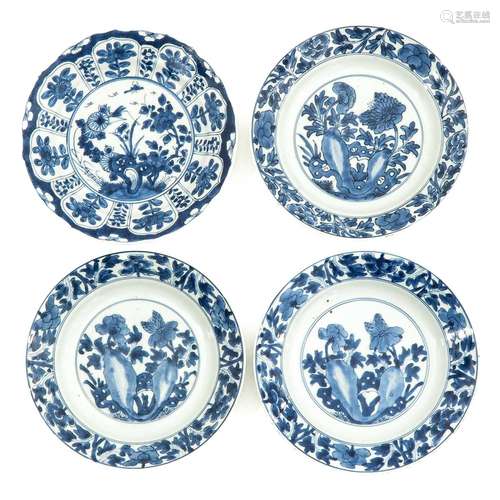 A Collection of 4 Blue and White Plates