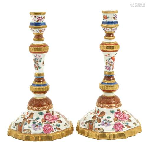 A Pair of Famille Rose Candlesticks