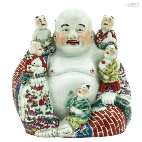 A Famille Rose Buddha Sculpture