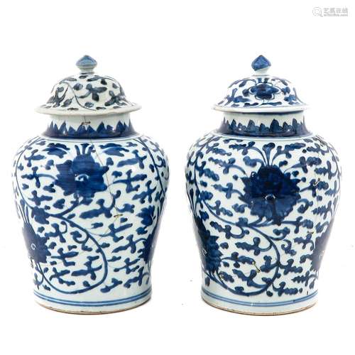 A Pair of Blue and White Jars with Covers