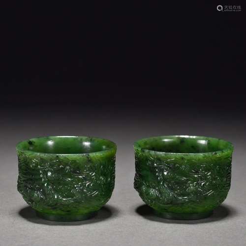 A pair of jasper embossed dragon and bead cups