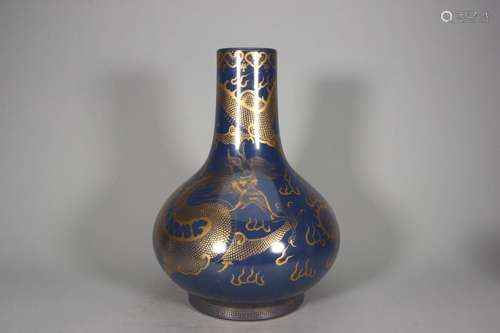 Water chestnut vase with blue glaze and gold dragon pattern