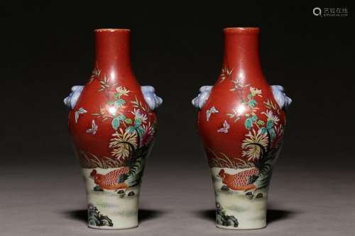 A pair of alum-red ground famille rose descendants Bandai pi...