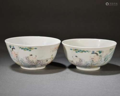 A pair of light crimson bowls with figures and stories