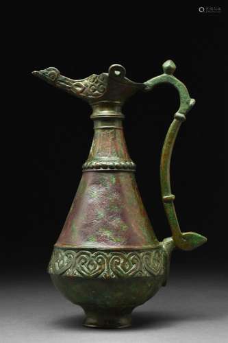 SELJUK BRONZE EWER WITH LAMP-SHAPED SPOUT