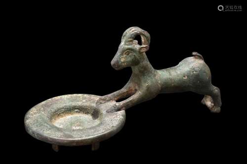 SASANIAN BRONZE PLATE WITH AN IBEX