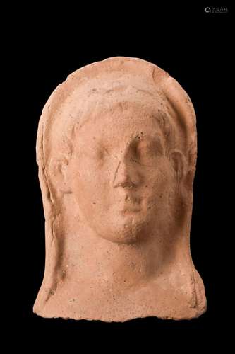 GREEK TERRACOTTA PROTOME OF A GODDESS