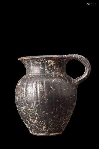 APULIAN BLACK GLAZE CUP WITH HANDLE