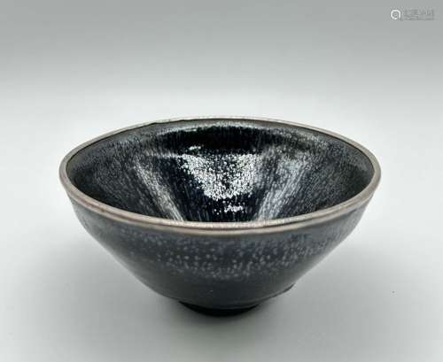 A Chinese tenmouk bowl with silver wrapped rim, Ming Dynasty...