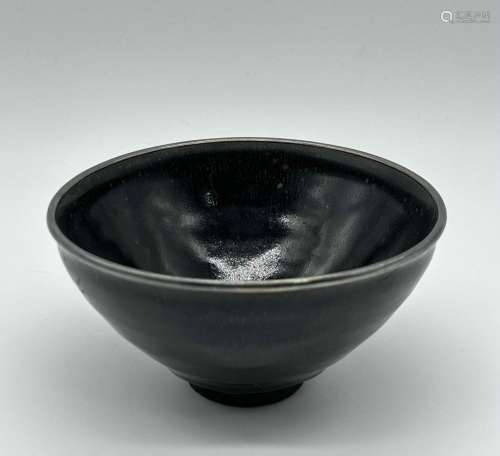 A Chinese tenmouk bowl with silver wrapped rim, Ming Dynasty...
