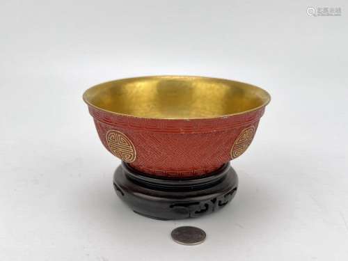 A gilted Chinese carved red bowl, Qing Dynasty Pr.