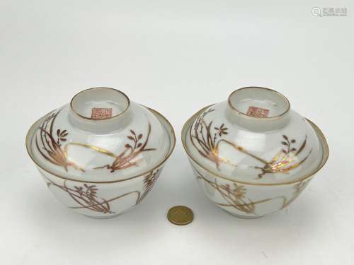 A pair of Chinese famille rose cups with covers, Qing Dynast...
