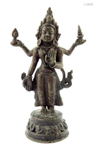 A cast bronze figure of Vishnu, modelled standing on a retic...