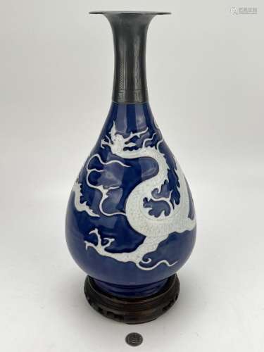A Chinese blue ground carved vase, Ming Dynasty Pr.