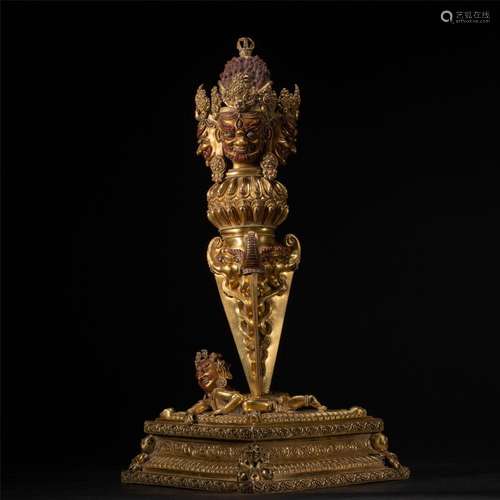 A TIBETAN BRONZE-GILT PHURBA