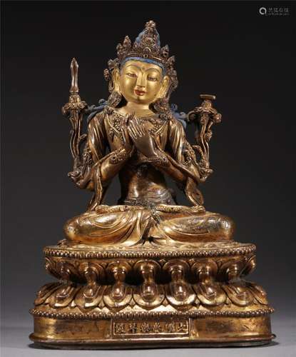 A TIBETAN BRONZE-GILT MANJUSRI