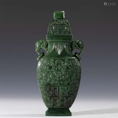 A CHINESE CARVED SPINACH GREEN JADE VASE