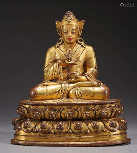 A TIBETAN BRONZE GILT PADMASAMBHAVA