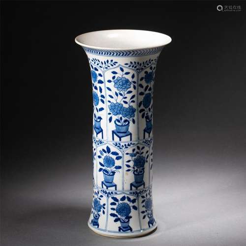 A CHINESE BLUE AND WHITE BEAKER VASE GU