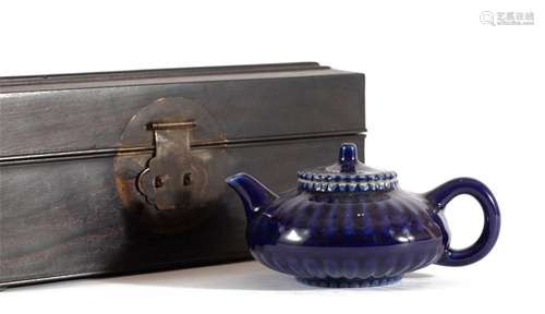 A CHINESE BLUE GLAZE TEAPOT