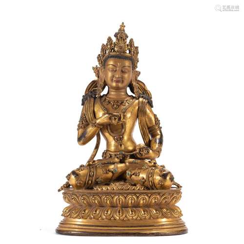 A TIBETAN BRONZE-GILT VAJRASATTVA