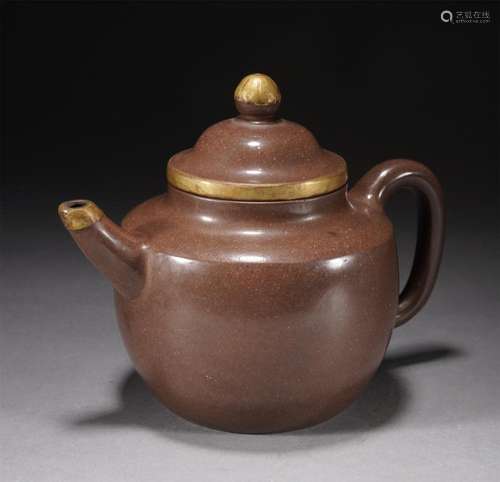 A CHINESE YIXING GLAZE ZISHA TEAPOT