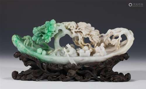 A CHINESE JADEITE CARVING OF FIGURES IN A BOAT