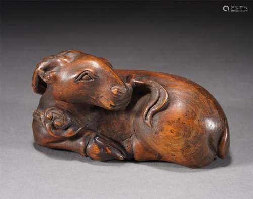 A CHINESE CARVED BOXWOOD RAM