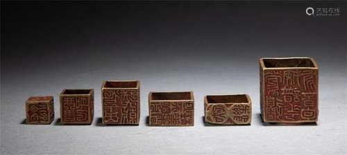 A GROUP OF SIX CHINESE INSCRIBED BRONZE SEAL