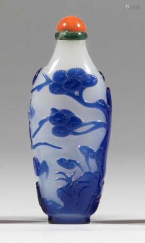 A violet-blue overlay semi-opaque white glass bottle Pine, l...