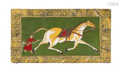 A MUGHAL PAINTING OF A GALLOPING HORSE WITH TRAINER & RE...
