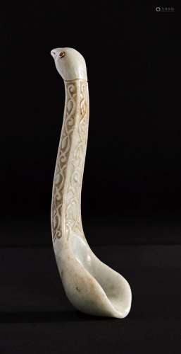 AN INDIAN CARVED JADE SPOON IN THE FORM OF A PEACOCK, 20TH C...