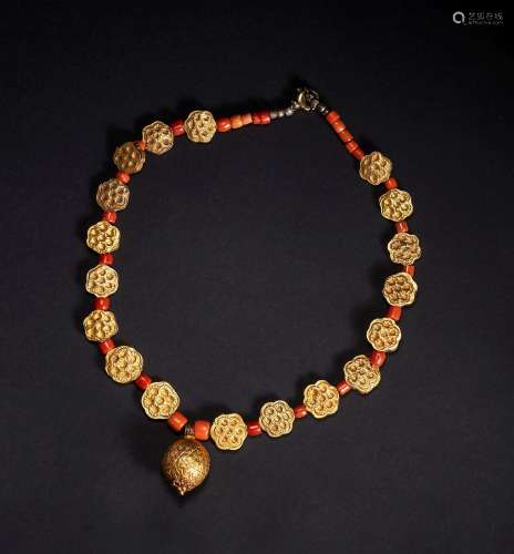 A BUKHARTA GOLD & CORAL NECKLACE, 20TH CENTURY