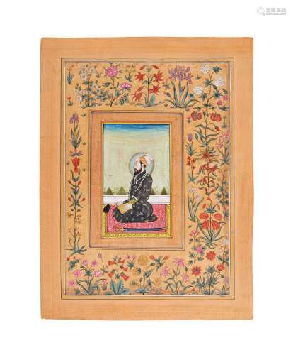 AN ILLUSTRATED AND ILLUMINATED ALBUM LEAF OF A SHAH PRAYING,...