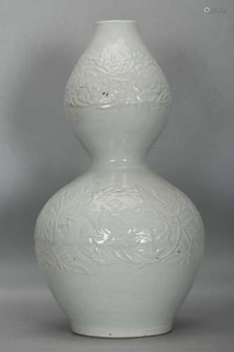 White glazed dark carved gourd bottle