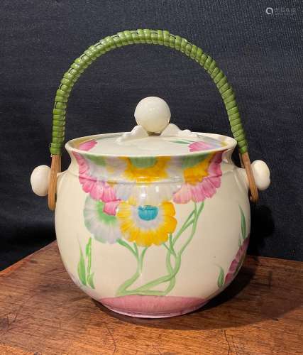 A Clarice Cliff Bizarre Pink Pearl pattern biscuit barrel an...