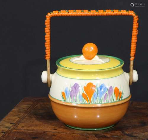 A Clarice Cliff Crocus pattern biscuit barrel and cover, pai...