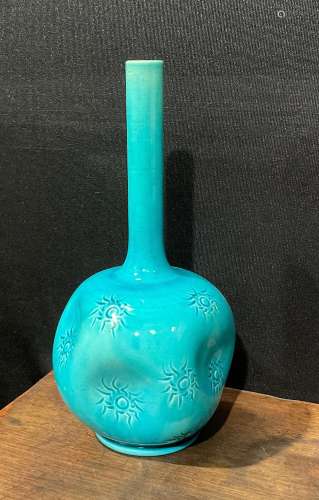 A Burmantofts Faience bottle vase, dimpled globular body, ap...