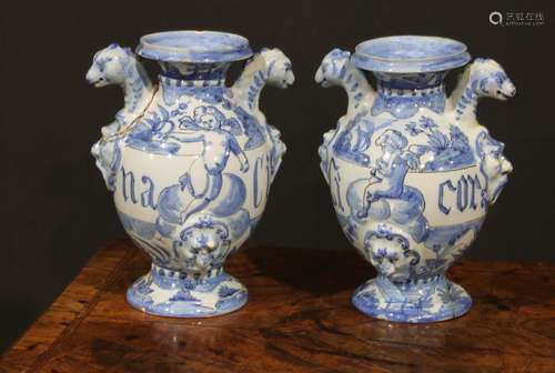 A pair of Delft apothecary drug jars, each inscribed and pai...