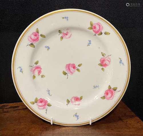 A Flight Barr & Barr circular plate, painted with scatte...