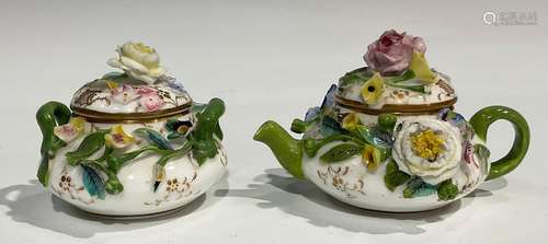 An English porcelain miniature teapot and sucrier, probably ...